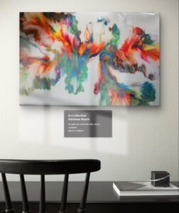 Large abstract acrylic painting by RJ Collective with vibrant flowing colours across a white base. "Rainbow Bloom" celebrates energy, diversity, and joyful movement in resin-coated form.