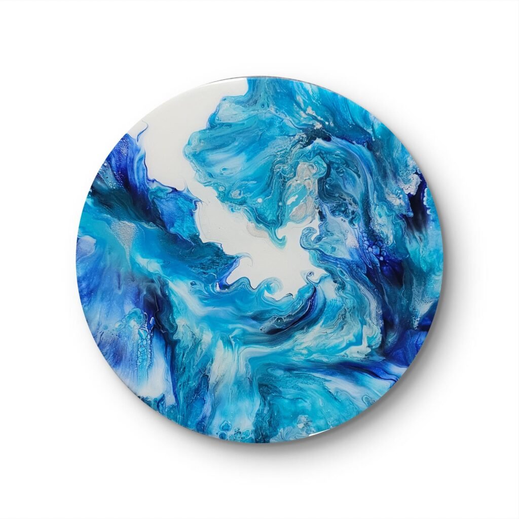 Circular abstract acrylic painting titled Azure Wave by RJ Collective. Layers of turquoise, cobalt, and pearl tones swirl fluidly across a round canvas, evoking oceanic motion and calm.
