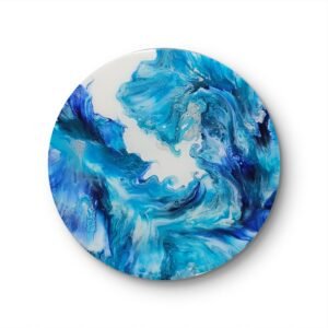 Circular abstract acrylic painting titled Azure Wave by RJ Collective. Layers of turquoise, cobalt, and pearl tones swirl fluidly across a round canvas, evoking oceanic motion and calm.